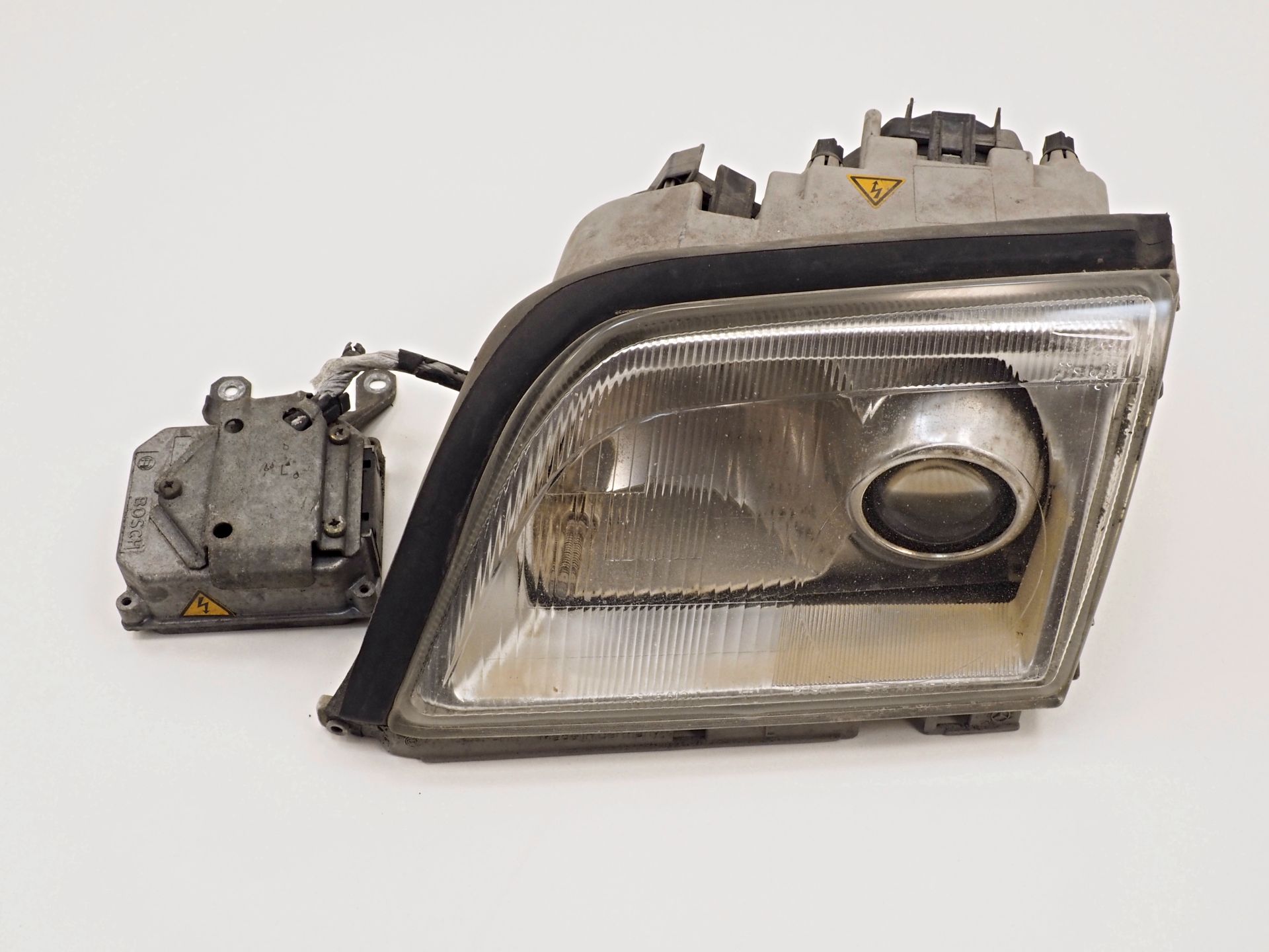 1298208761 - Xenon headlight left side | 3120