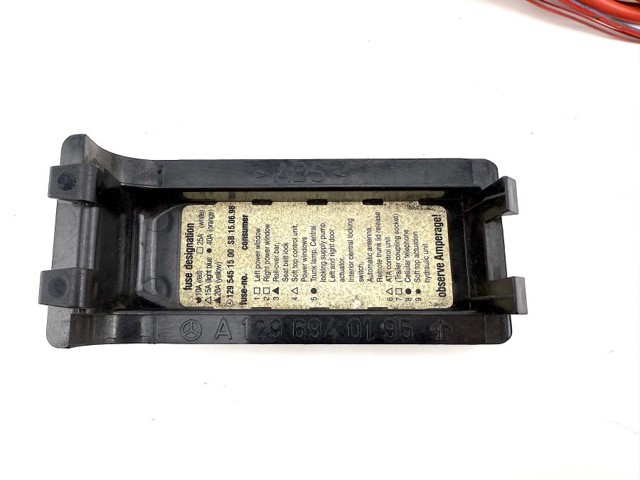 1295451347 1296940195 1295451347 | Mercedes SL500 | R129 Trunk fuse box fuse mount
