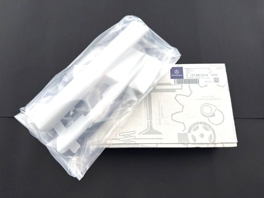 1298800205 12988002059999 | Mercedes SL-Class | R129 Facelift front bumper tow hook cover